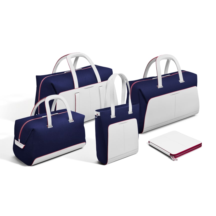 <p>Available as individual pieces or as a full set, the Inspired by Fashion luggage collection is available in four colourways-- two to compliment the rebellious rule-breaking Re-Belle and two to enhance the contemporary luxury of Fu-Shion. </p>
<p>For the Re-Belle, choose from a subtle Cashmere Grey with eye-catching Lime Green accents or an Arctic White and Navy alternative with beautiful Peony Pink highlights. </p>
<p>For Fu-Shion, choose from a rich Black canvas with beutifully bold Forge Yellow leather, or opt for a Blue canvas and Iceland Moss leather with subtle Mandarin accents. </p>
<p>Dimensions</p>
<p>48hr Weekender: L560 x D270 x H330 mm</p>
<p>24 hr Weekender: L500 x D200 x H300 mm</p>
<p>Holdall: L470 x D240 x H250 mm </p>
<p>Tote: L380 x D130 x H360 mm </p>
<p>Organiser Pouch: L350 x D20 x H270 mm </p>