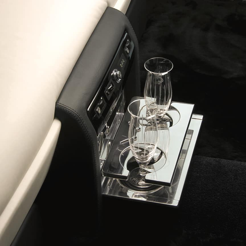 <p>Beautifully engineered, milled and polished from solid aluminium, this dual drinks holder is both practical and stylish. Only available for vehicles with coolbox for lounge seats (please flutes shown in picture are for illustration purposes only, available to purchase separately)</p>
