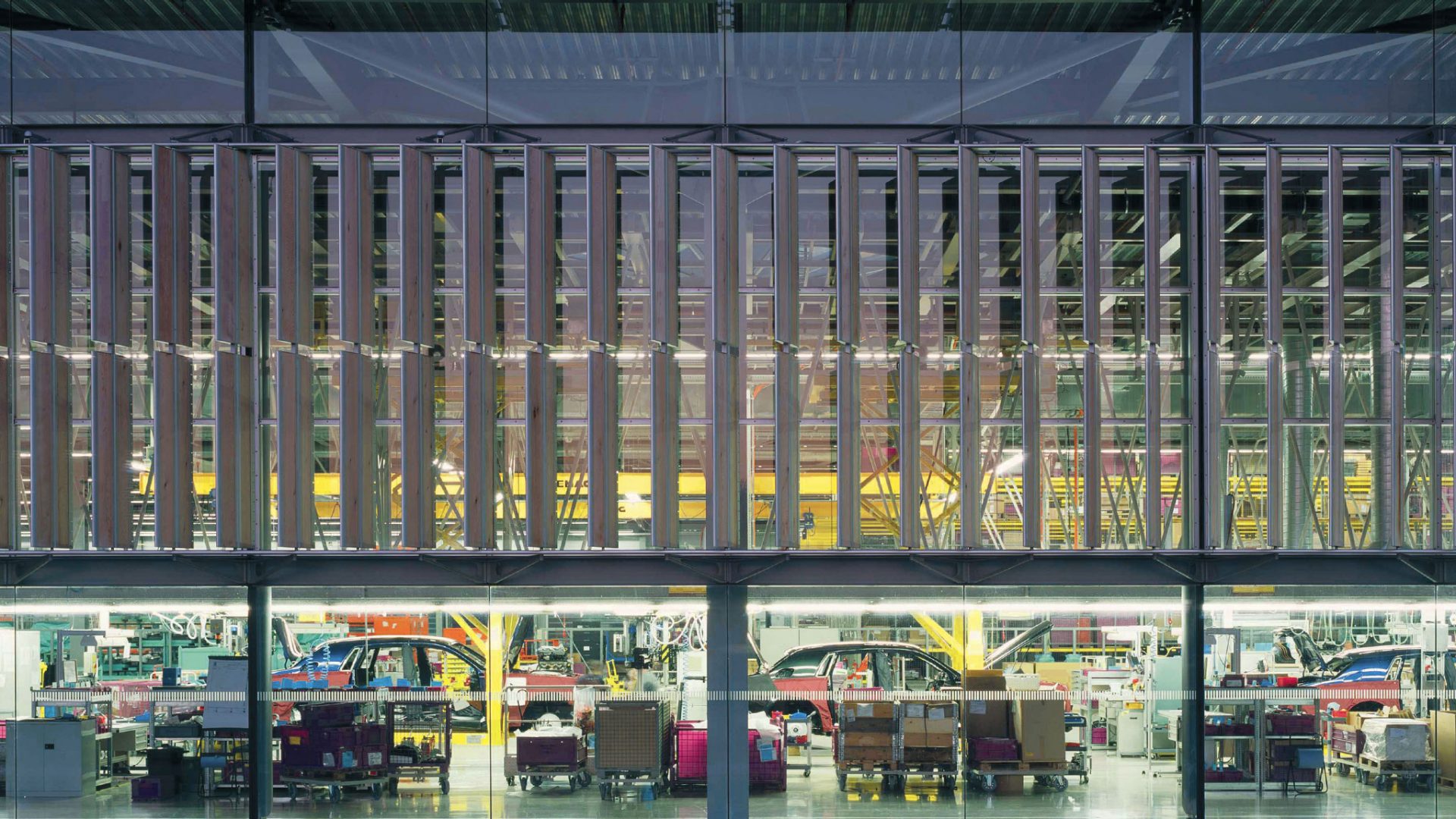 Side on exterior image of the production line at the Rolls-Royce factory at Goodwood.