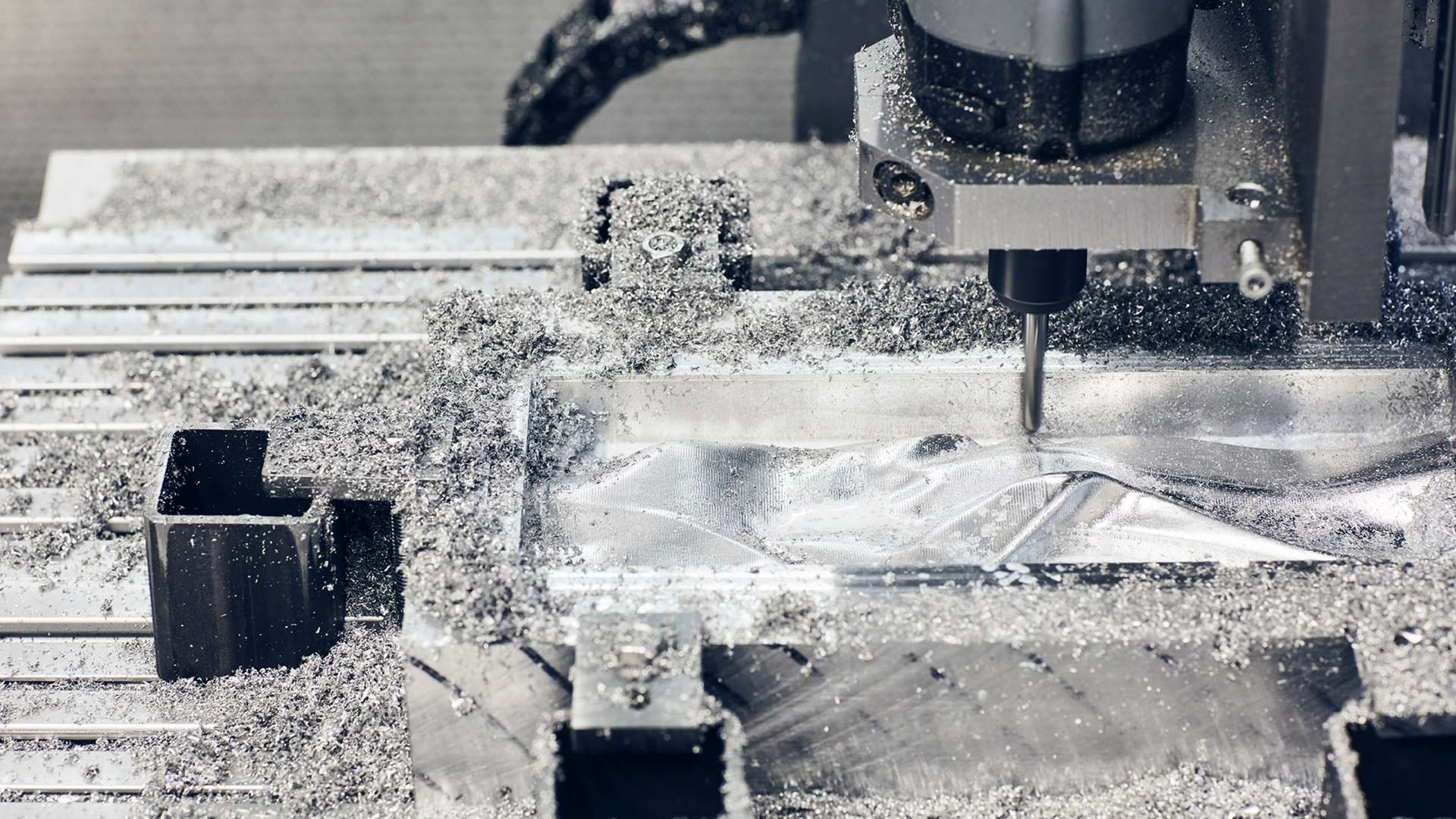 A close up showing London artists Based Upon working on a Bespoke Phantom Gallery crafted from aluminium