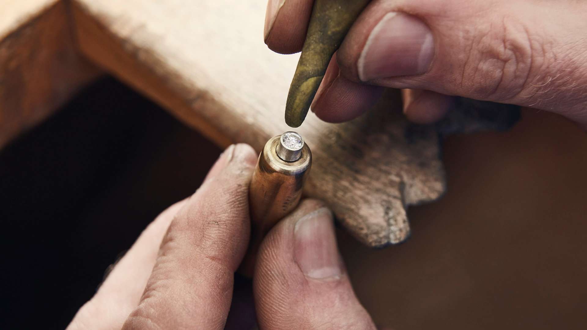 A close up of a craftsman at work on the Fox Silver Bespoke Phantom Gallery 