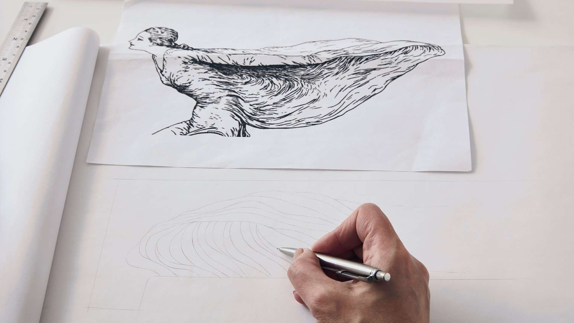An image showing designer Helen Ann Murrey taking inspiration from an old illustration of the Spirit of Ecstasy to create a Phantom Gallery