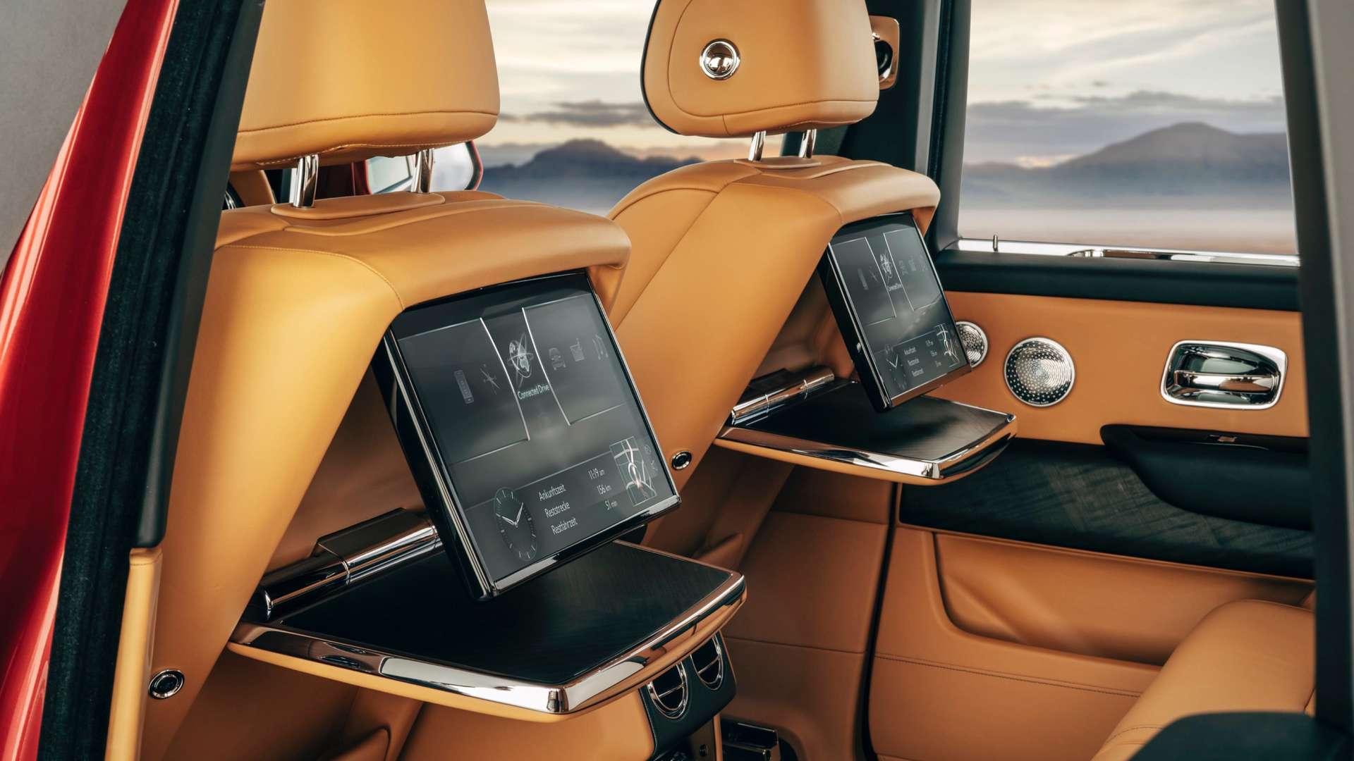 The rear TV screens in operation in the Rolls-Royce Cullinan.