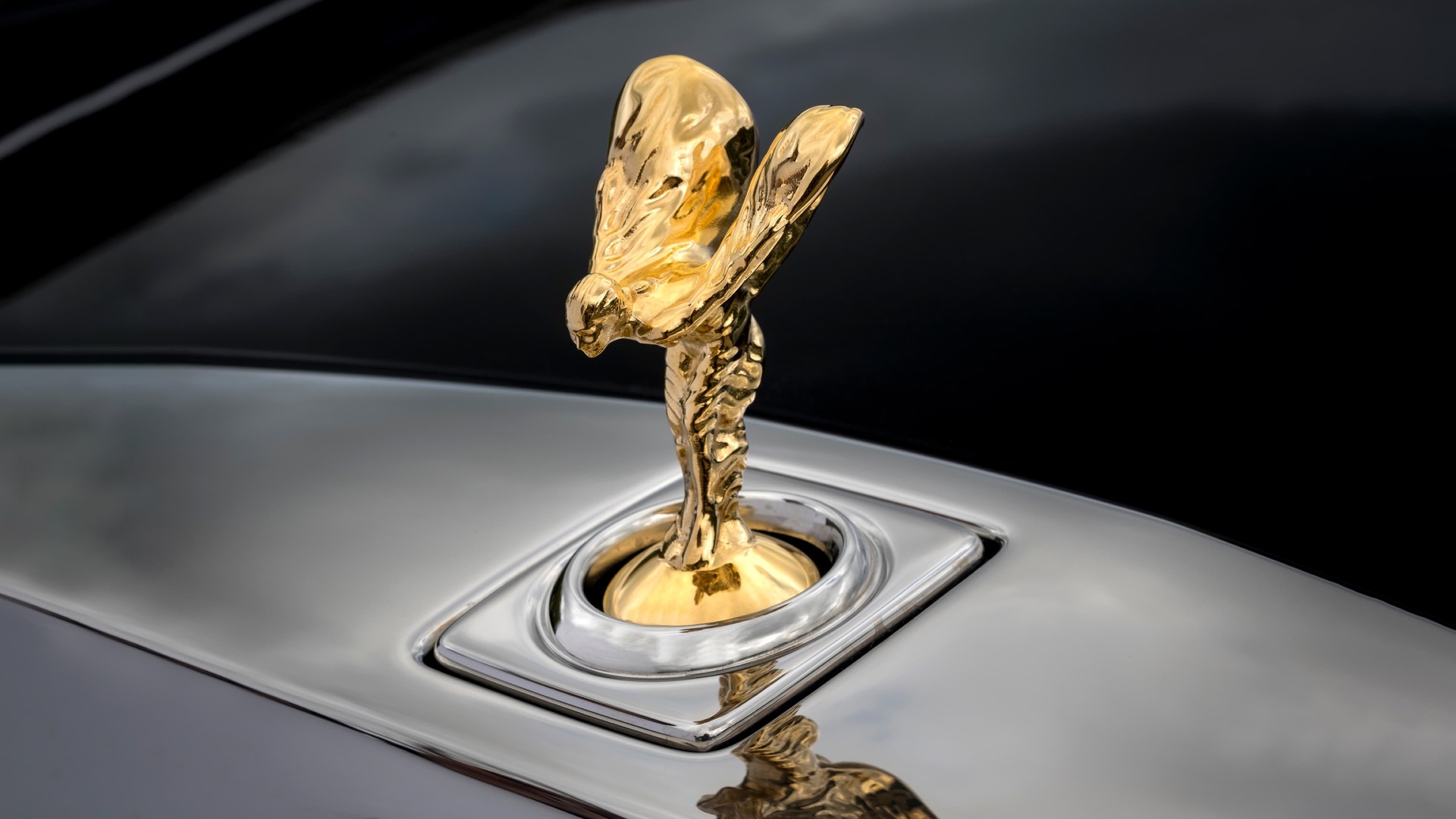 Gold Spirit of Ecstasy on bespoke Rolls-Royce Phantom Horology motor car