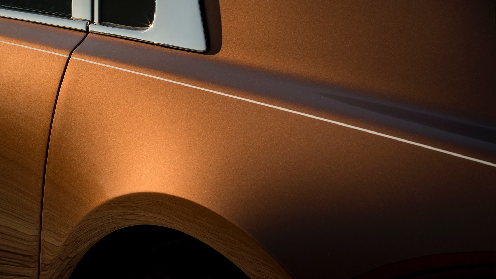 Exterior close up of copper Rolls-Royce Phantom extended wheelbase