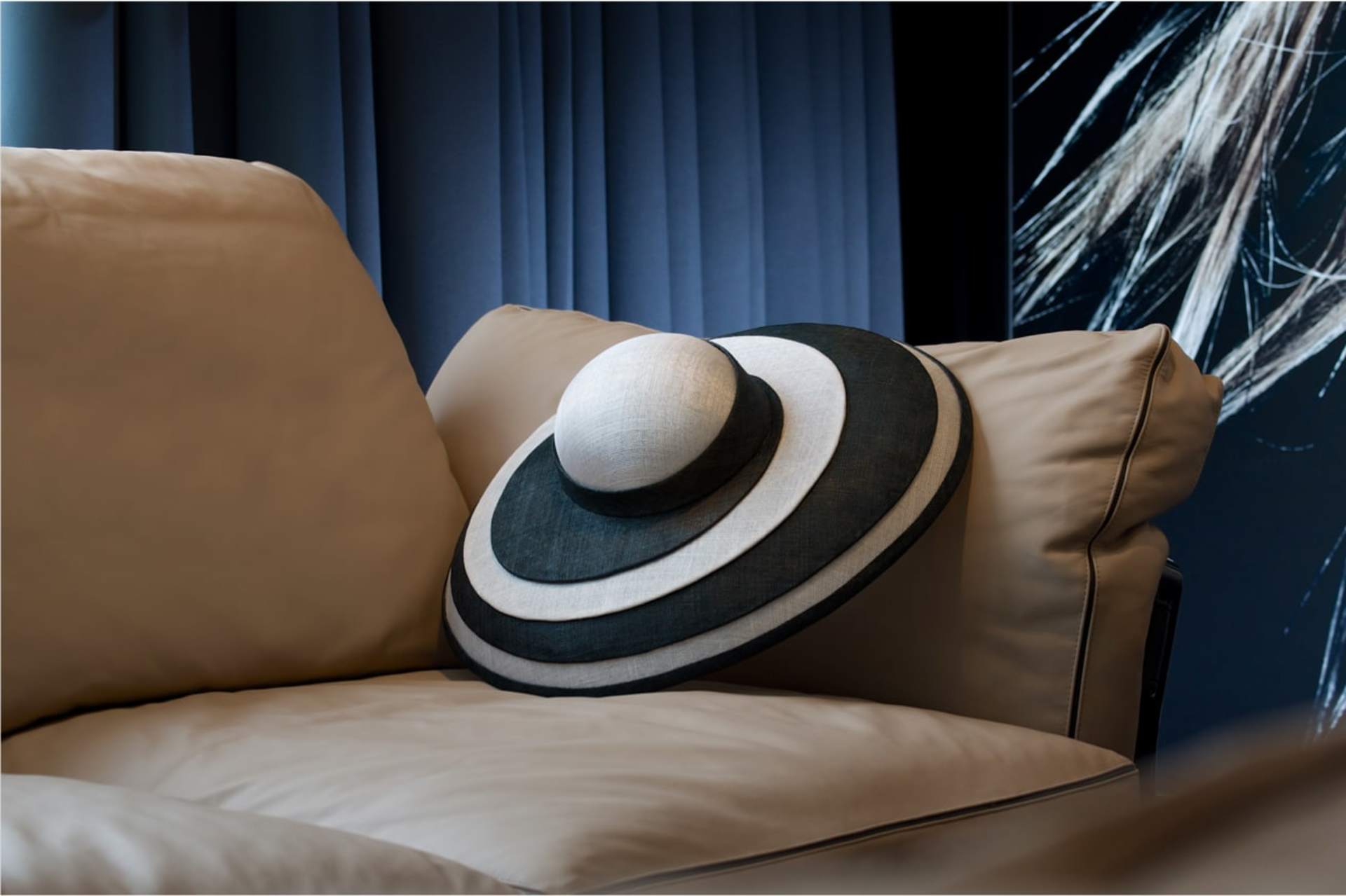 image of rolls-royce trevor morgan hat on a sofa