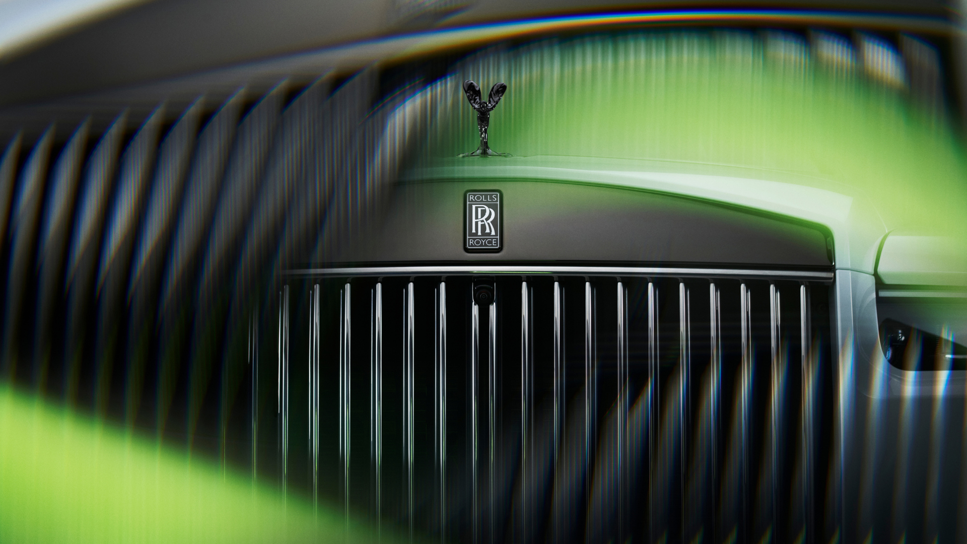 Close front view of Rolls-Royce motor car's grille