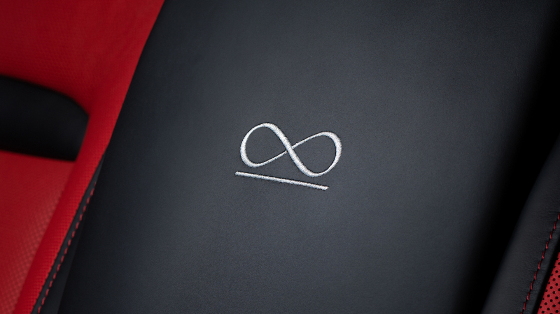 Red Interior of Black Badge Ghost displaying a logo