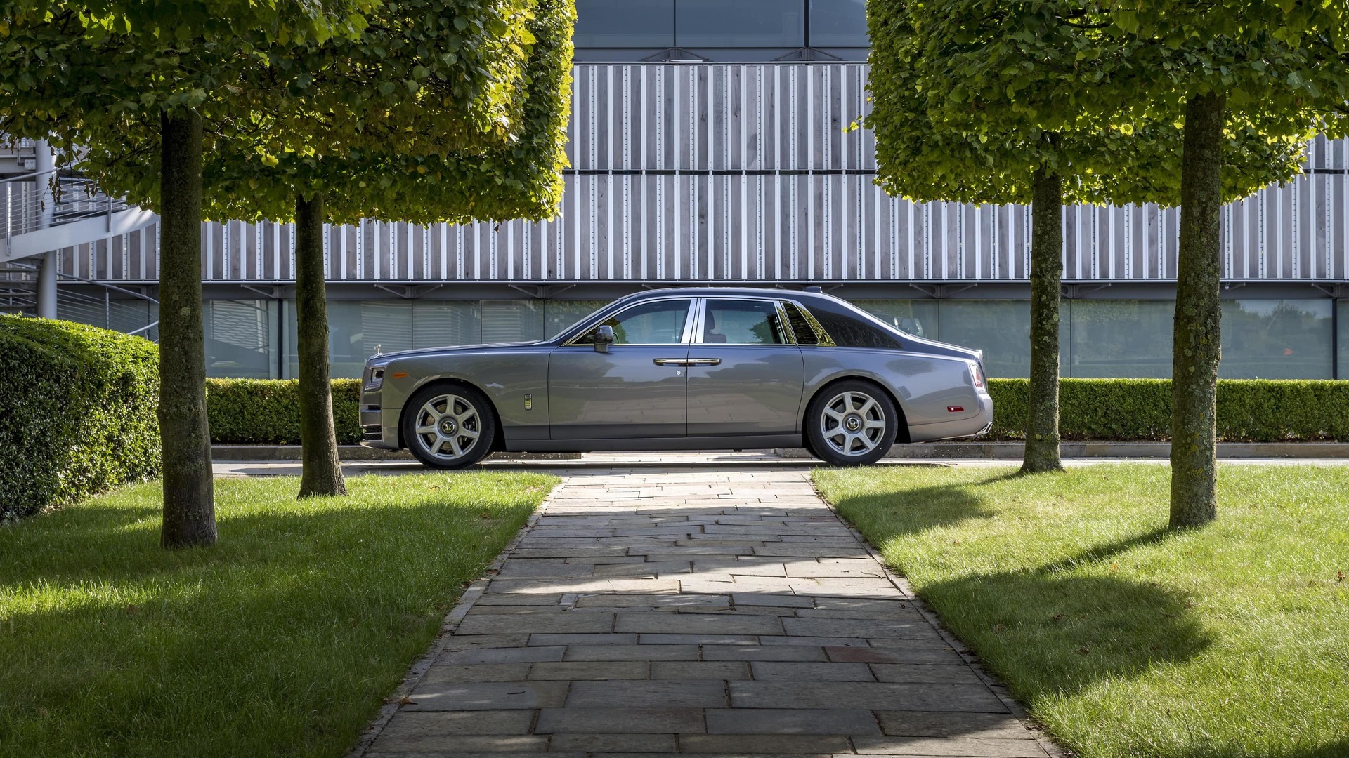 Rolls-Royce Motor Cars Accessory - Wheel style 677 - 21 inch star styled spoked wheel shown on a Phantom Rolls-Royce Motor Car, shot on the grounds in Goodwood.