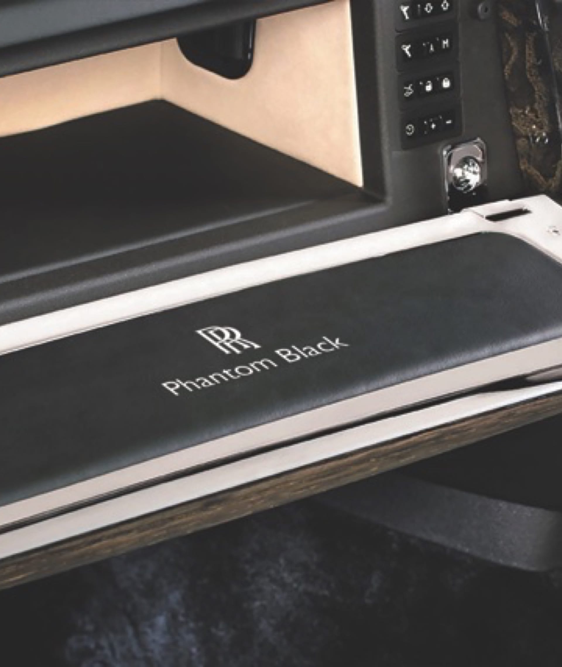 Personalised glove box lid in a bespoke Rolls-Royce motor car