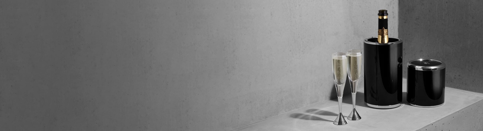 Sleek thermal cooler and crystal champagne flutes from the Rolls-Royce Champagne Chest