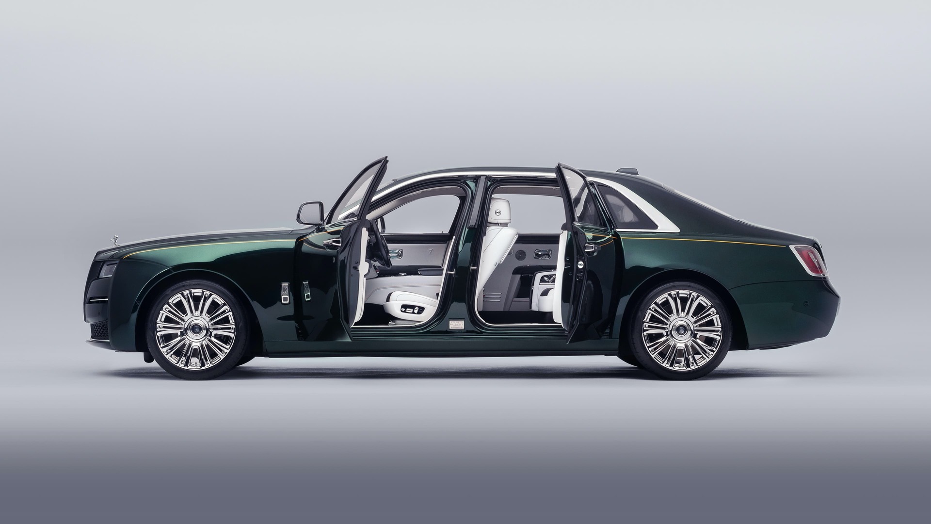 Exterior side view of 1:8 scale model of the Rolls-Royce Ghost motor car with doors open revealing interior details