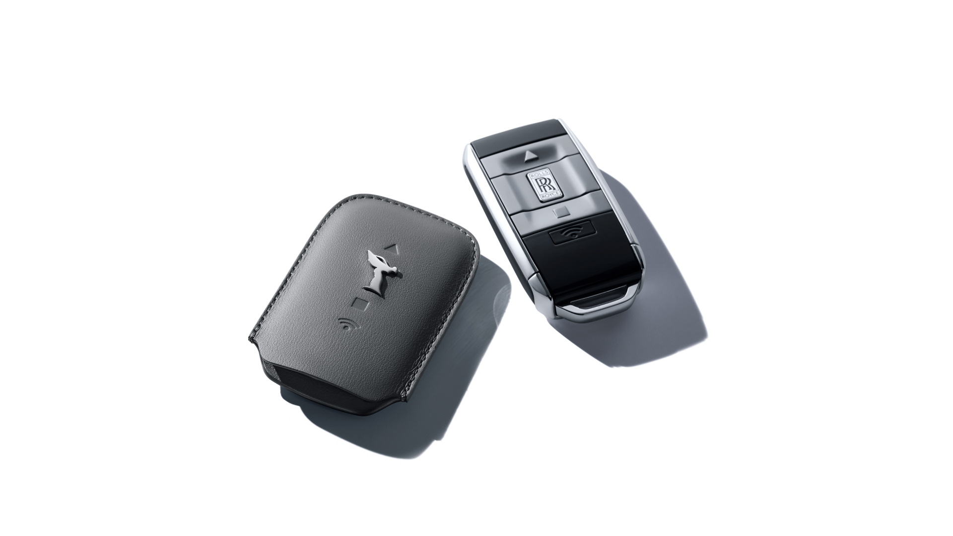 Rolls-Royce motor car key next to its key wrapper in Scivaro Grey and Black