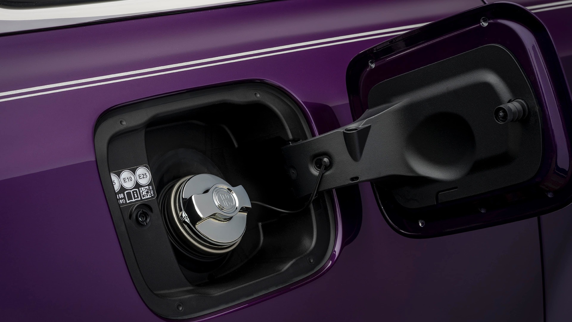Rolls-Royce metal fuel filler cap with monogram, created from high-quality polished chrome plating with mirror finish