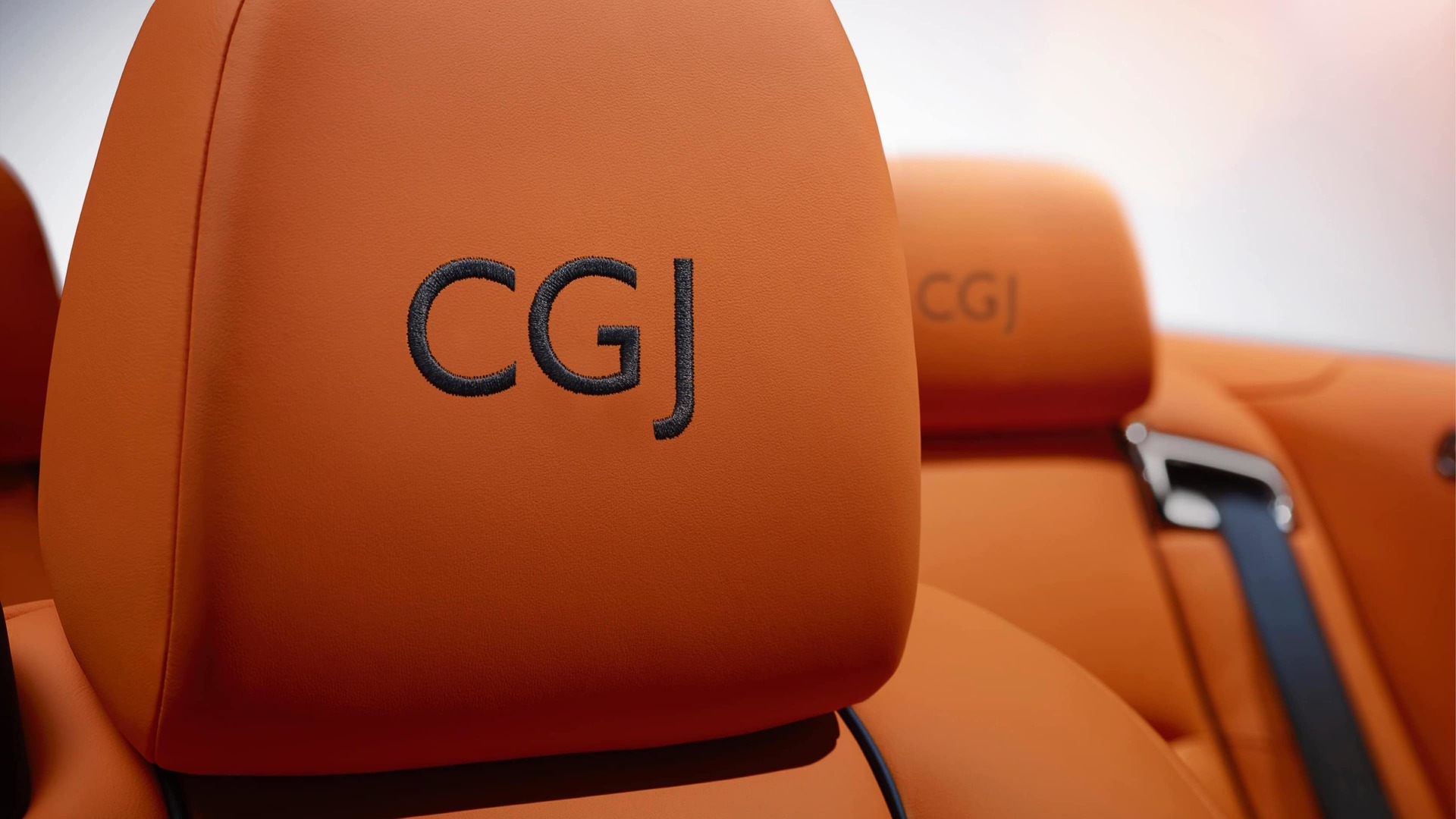 Rolls-Royce motor car headrests with elegantly embroidered personalised lettering