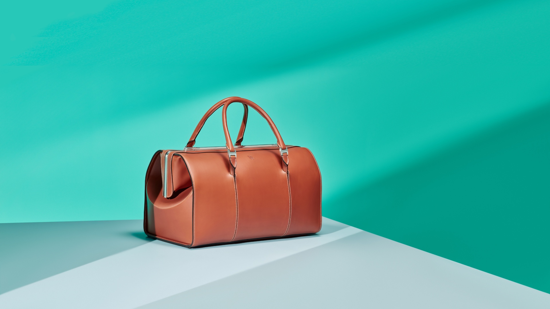 High-quality saddle leather Accessory bag in tan from the Rolls-Royce Phantom Luggage collection 