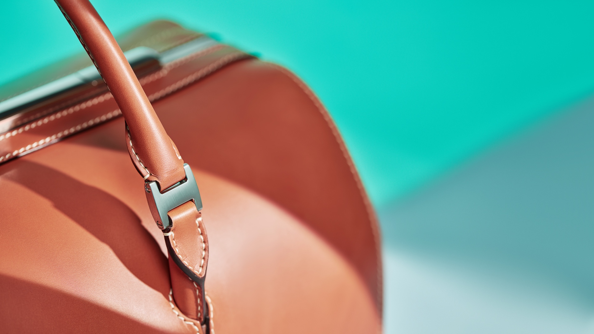 Close-up view of the Rolls-Royce Icon Luggage Collection handle