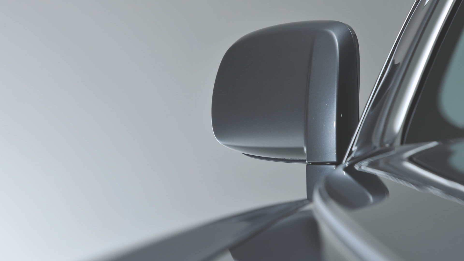 Close-up of restyled mirror blending seamlessly with the exterior of the Rolls-Royce motor car for a contemporary feel
