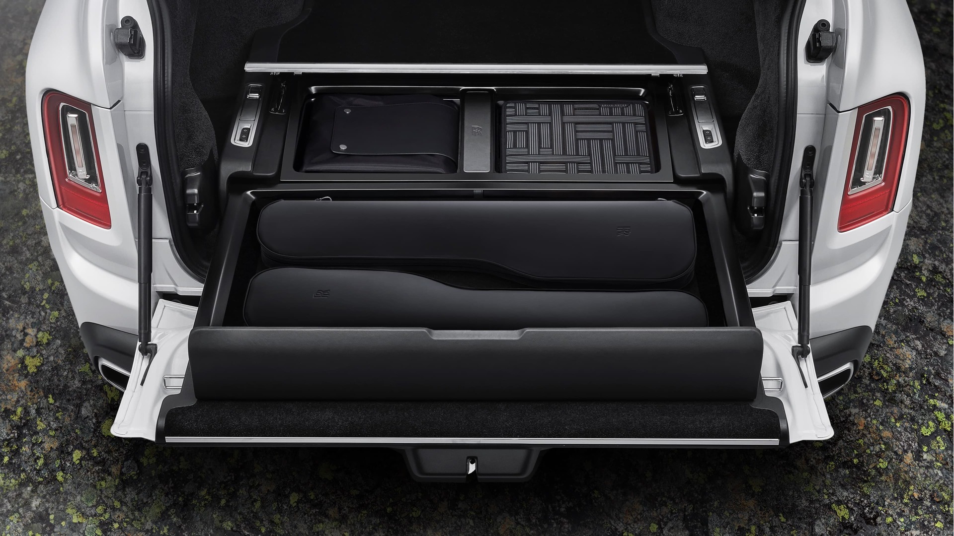 Pursuit Seat conveniently stowed in the trunk of the Rolls-Royce Cullinan motor car