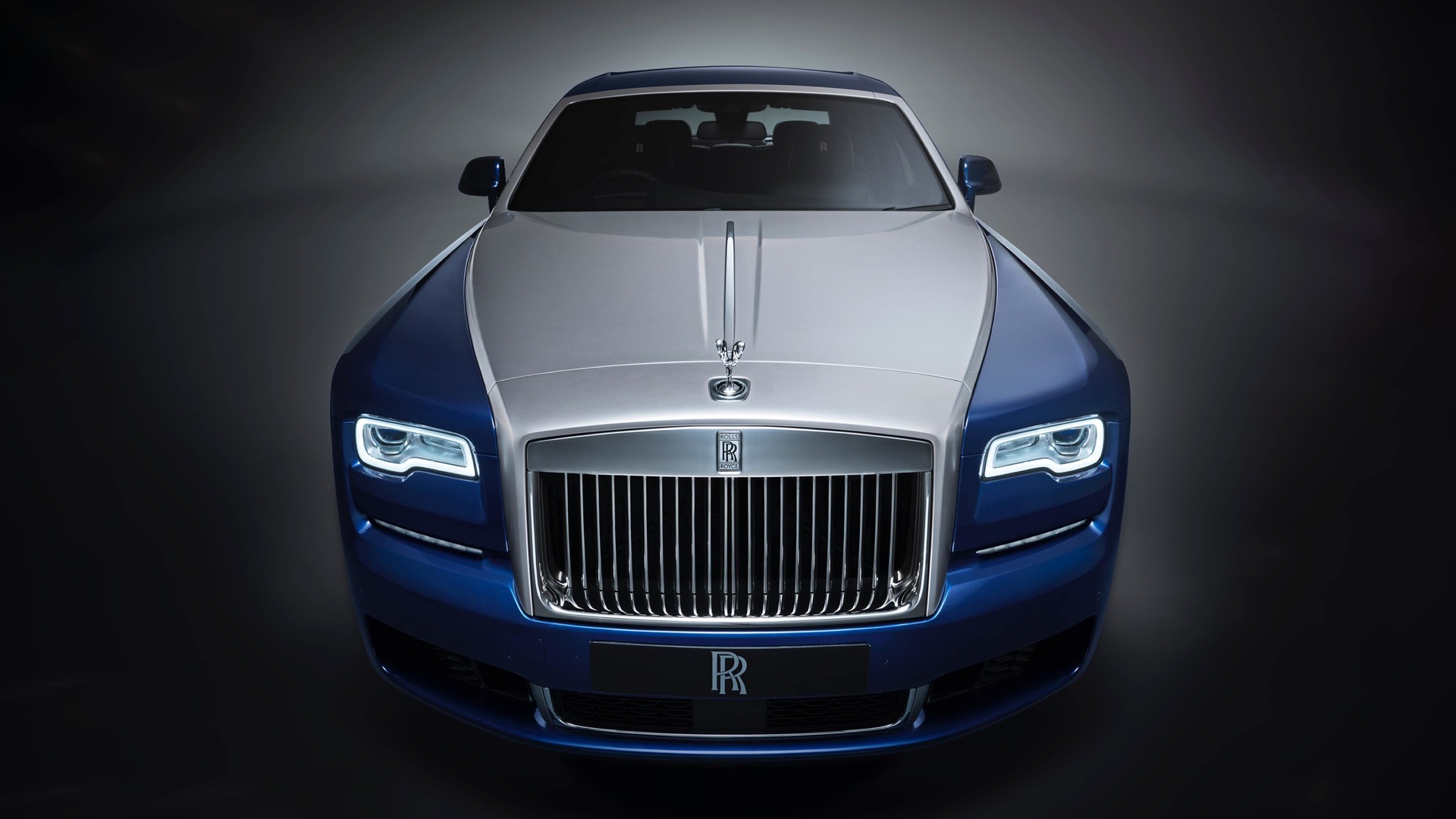 Close front exterior view of Rolls-Royce motor car with the Silver Satin Kit encompassing the bonnet, windscreen and grille surround