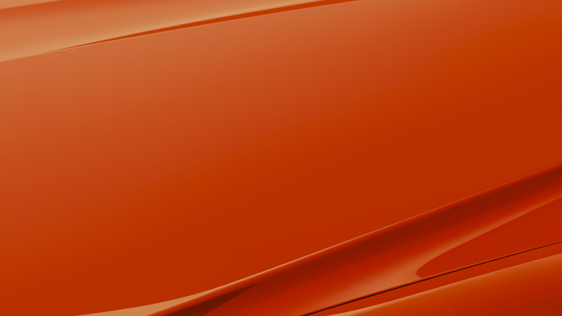 Close view of the hood of a Rolls-Royce in orange