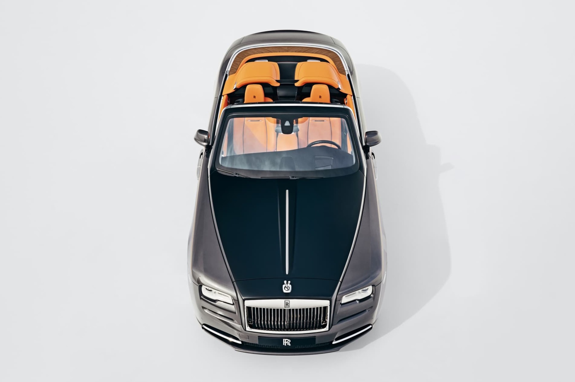 Exterior front aerial view of Rolls-Royce Dawn Aero Cowling with tonneau cover top down