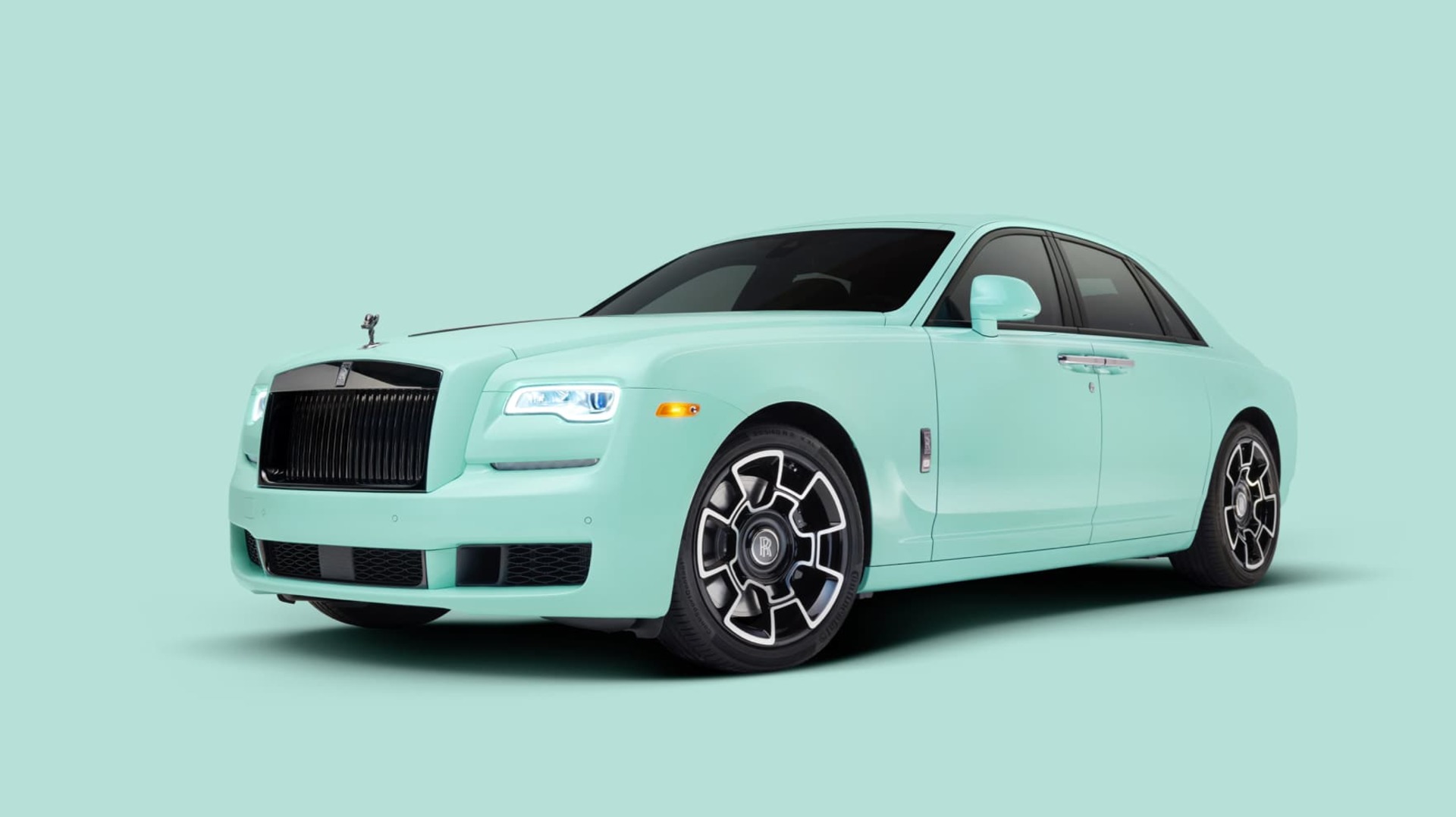 3/4 front exterior of stationary Rolls-Royce Ghost motor car in Cool Mint from the Pebble Beach Pastel collection