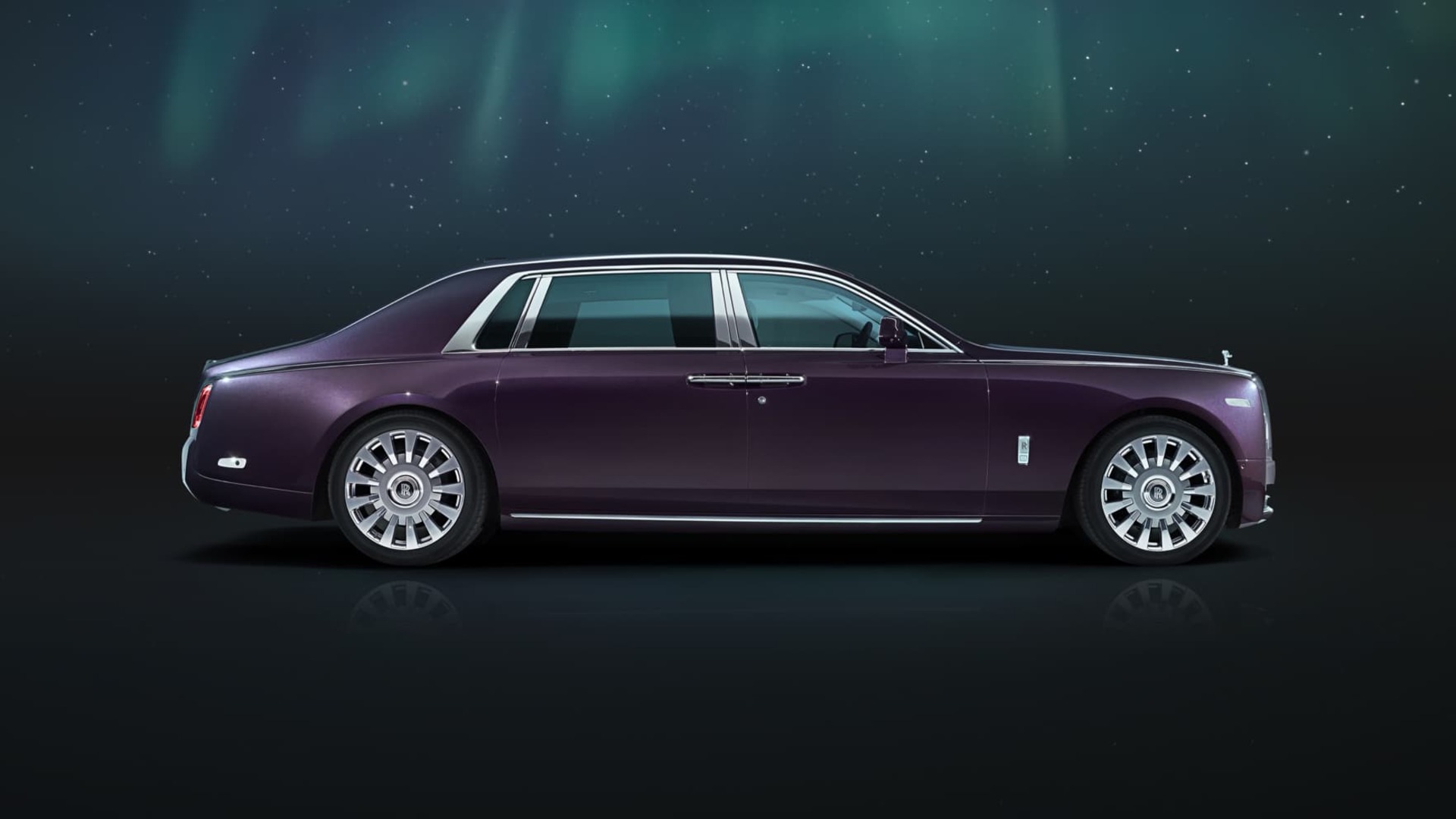 A side profile shot of a purple Rolls-Royce Phantom Extended