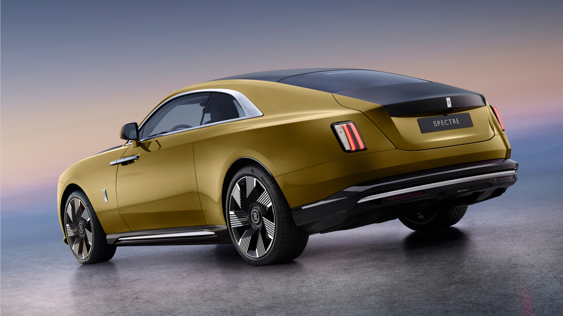 Photo of Spectre displaying the rear of the car with brake lights switched on