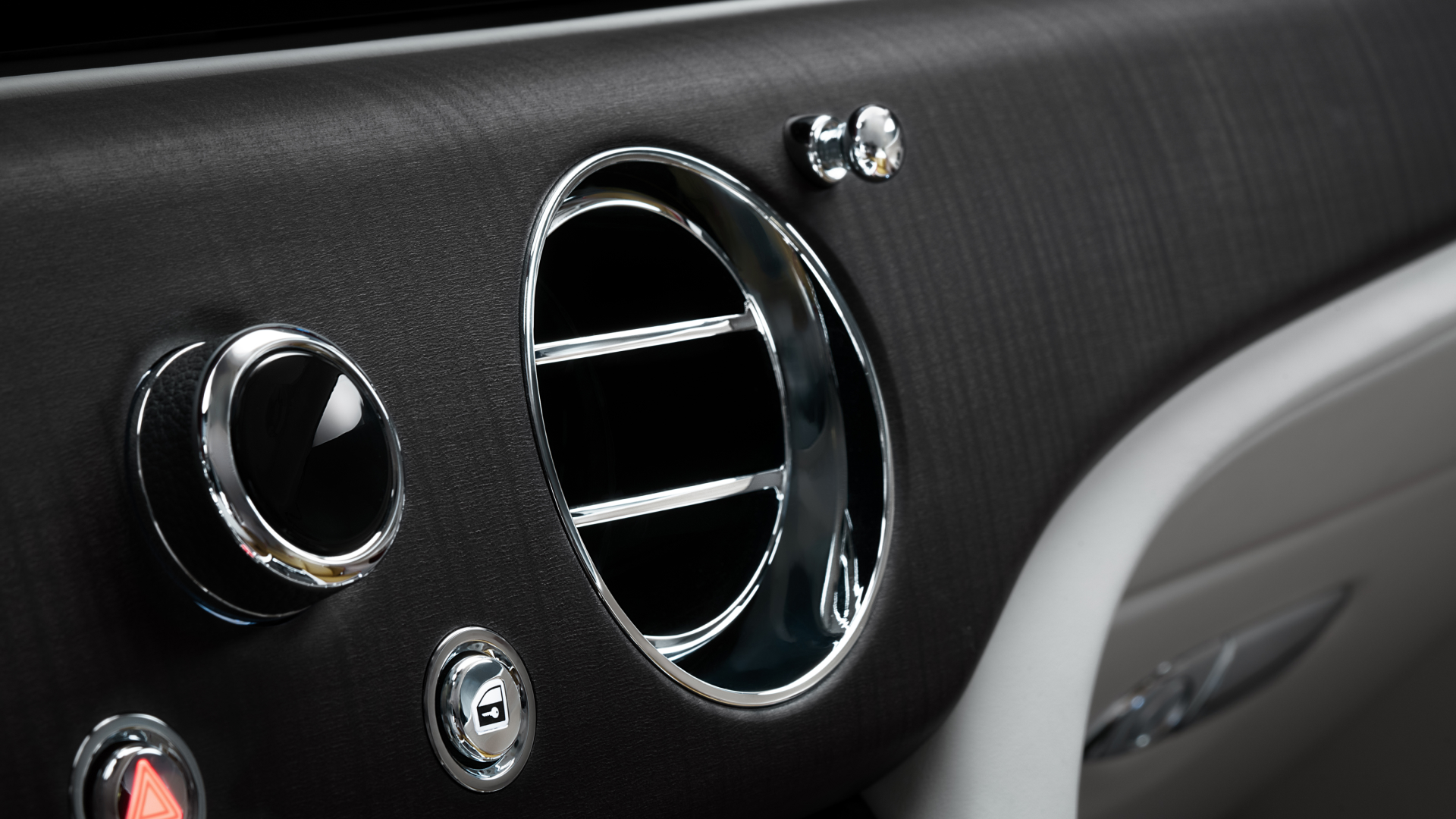 Exquisite Woodwork surrounding the dashboard in the Spectre